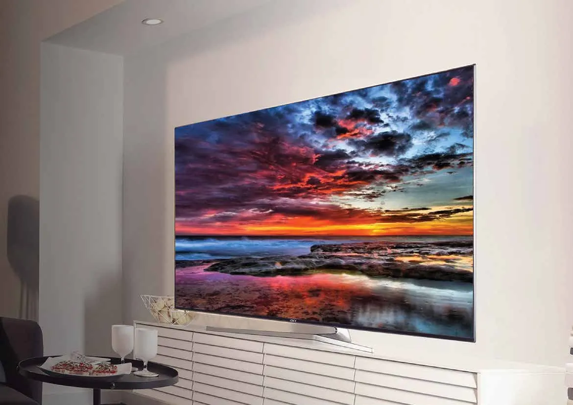 OXY TV with vivid colour on a modern wall unit